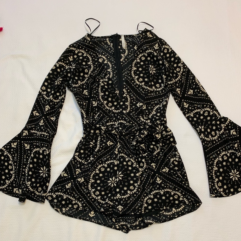 Sage clothing black romper with scalloped sleeves